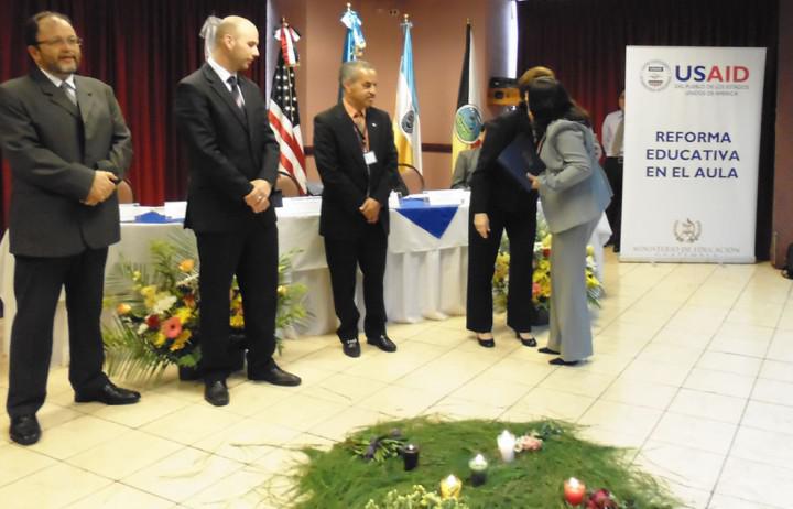 REAULA Program awardees receiving graduation diplomas